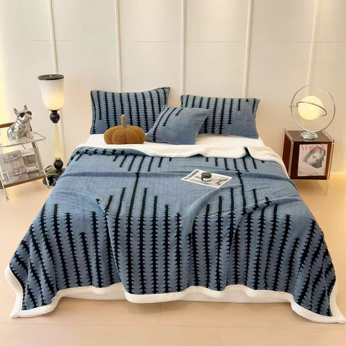 Blue patterned sherpa throw